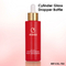 rote Farbflasche mit goldener Kappe